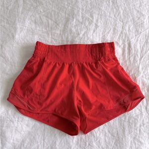 Lululemon women’s Hotty hot shorts orange size 4  2.5” L